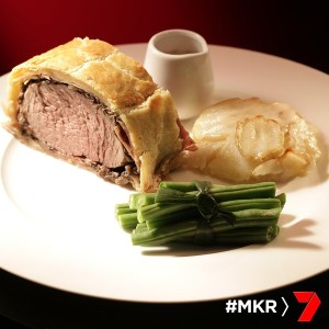 Beef wellington with potato galette and green beans