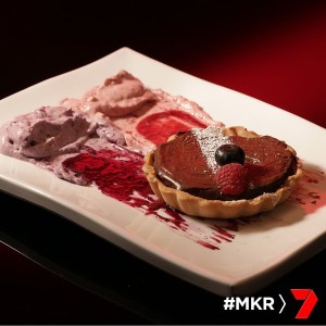 chocolate tart with raspberry and blueberry cream